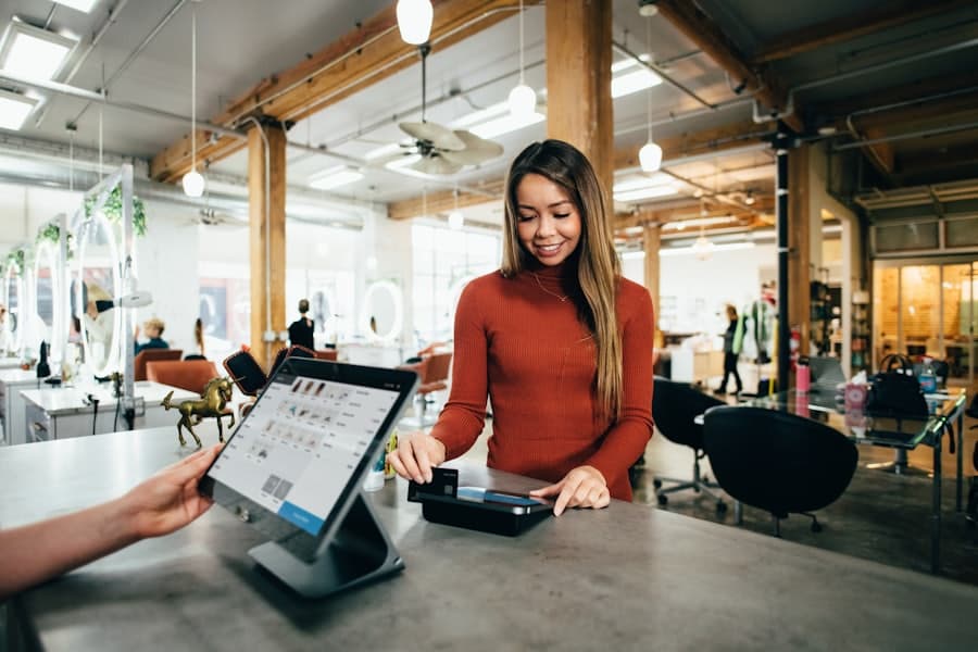 A shopper paying at a retail counter